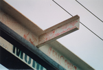 Close up view of the signed second floor beam by Library
